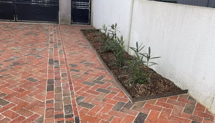 Réalisation d'une création de jardin par Numa Création, paysagiste à Coëx