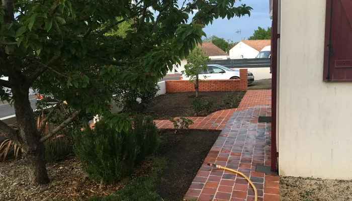 Réalisation d'une création de jardin par Numa Création, paysagiste à Coëx